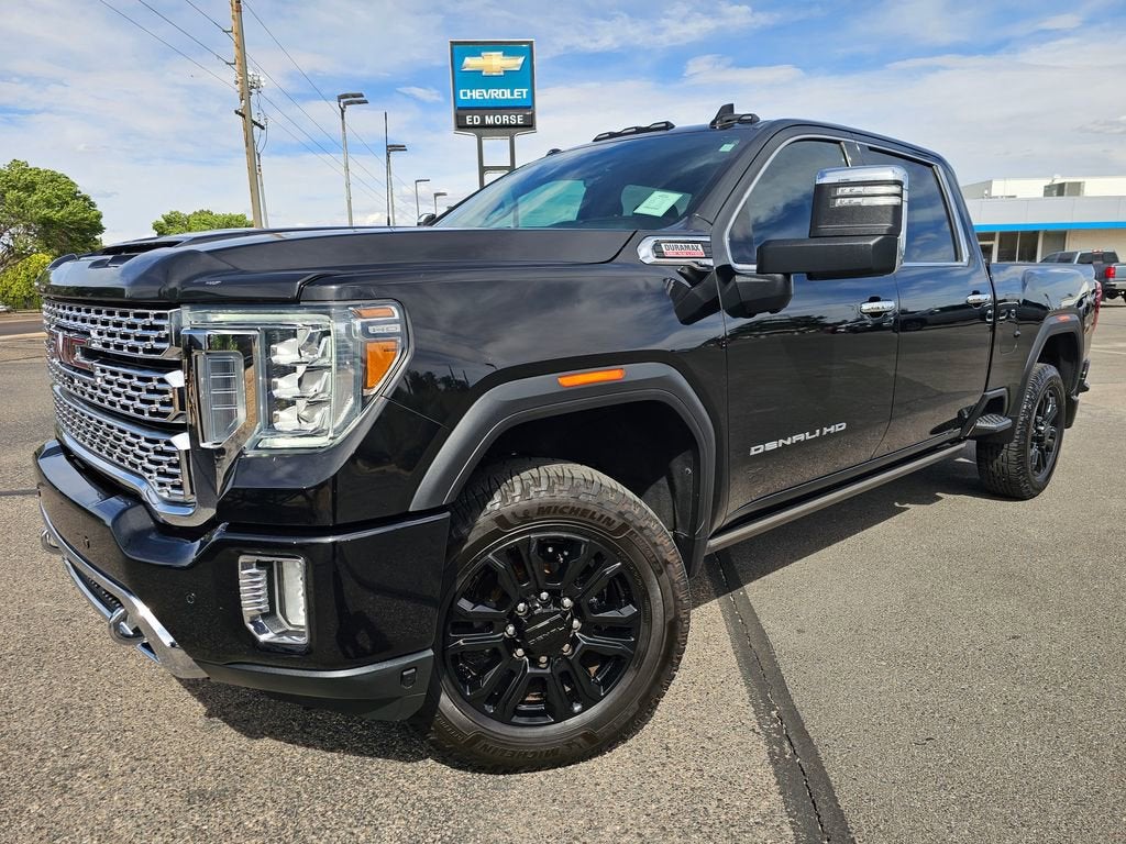 2021 GMC Sierra 2500 HD Denali in Ebony Twilight Metallic — front three-quarter view